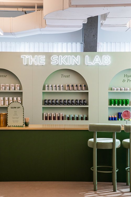 The Skin Lab display with products lined on the shelf.